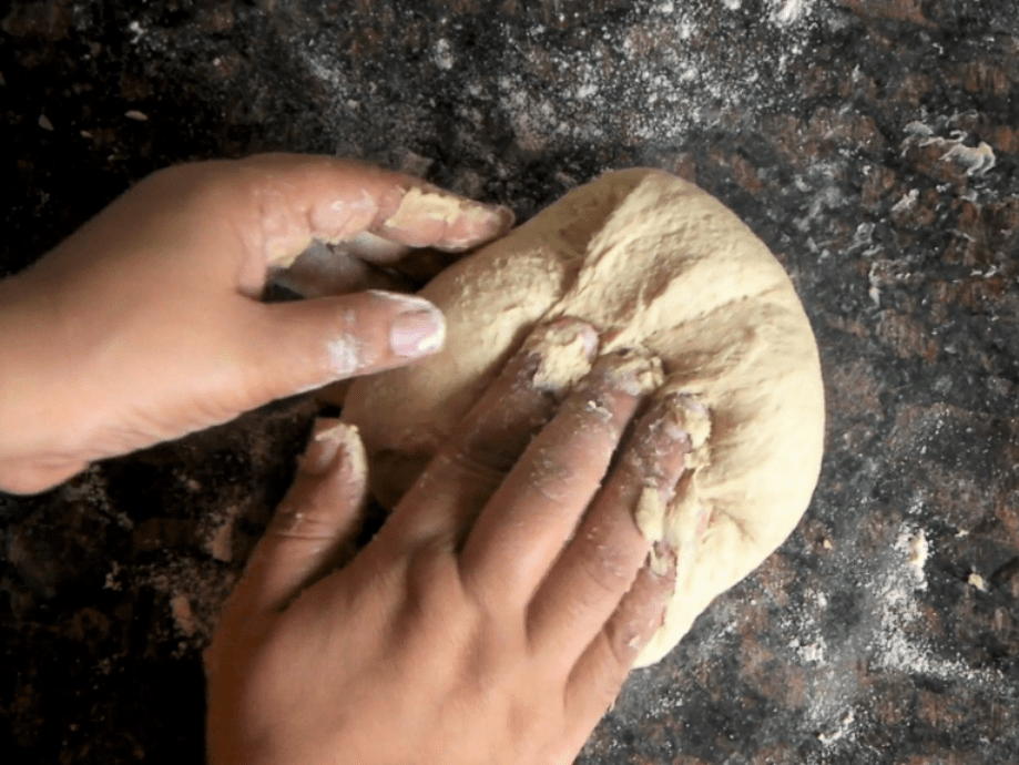 Whole wheat veggie pizza made with yeast from scratch