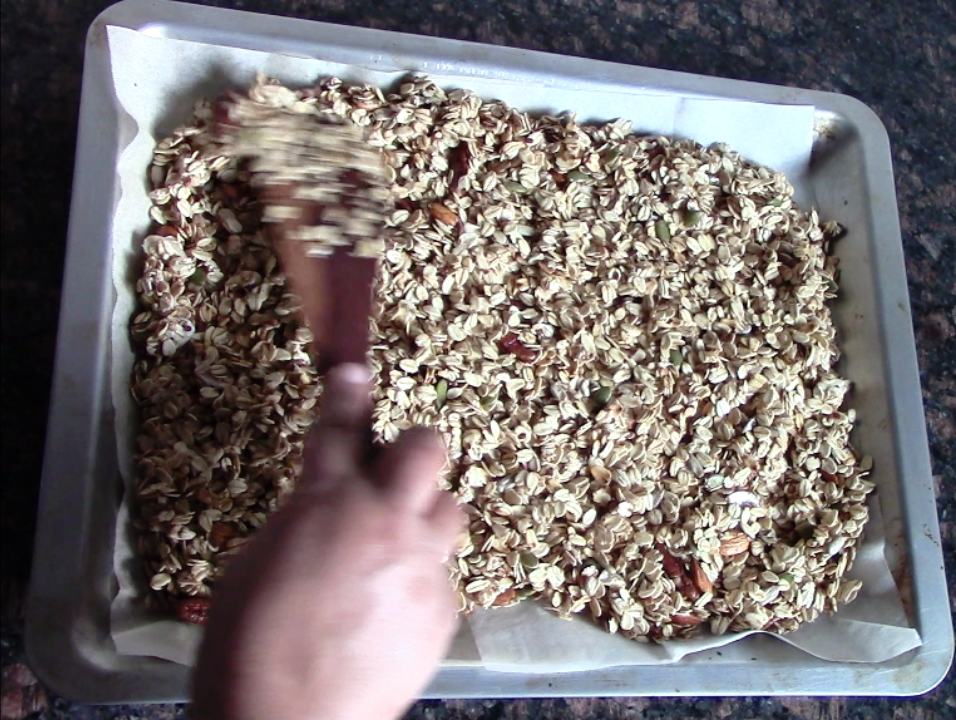 Homemade crunchy granola with nuts and raisins