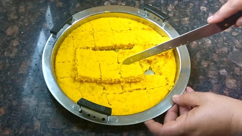 Soft & Fluffy Corn Dhokla Recipe with Fresh Corn | Easy Breakfast 15 cut into pieces Healthically Kitchen