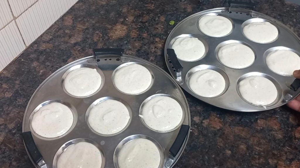 Soft & Spongy Jowar Idli Recipe – Healthy Millet Breakfast 13 jowar idli paste in idli mould Healthically Kitchen