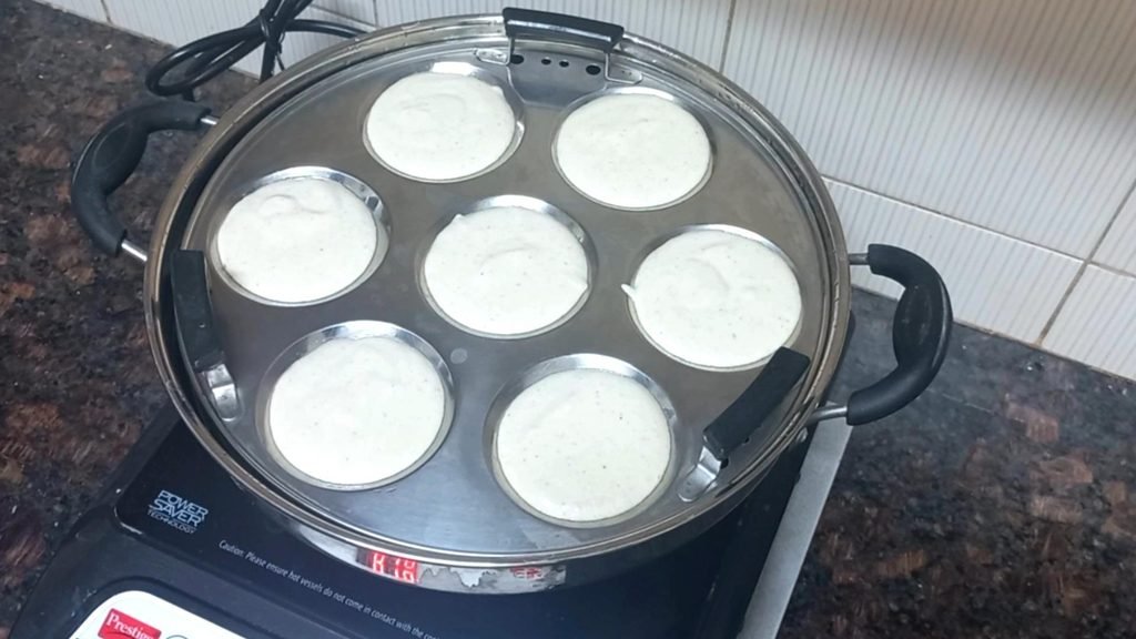 Soft & Spongy Jowar Idli Recipe – Healthy Millet Breakfast 14 steaming of jowar idli Healthically Kitchen