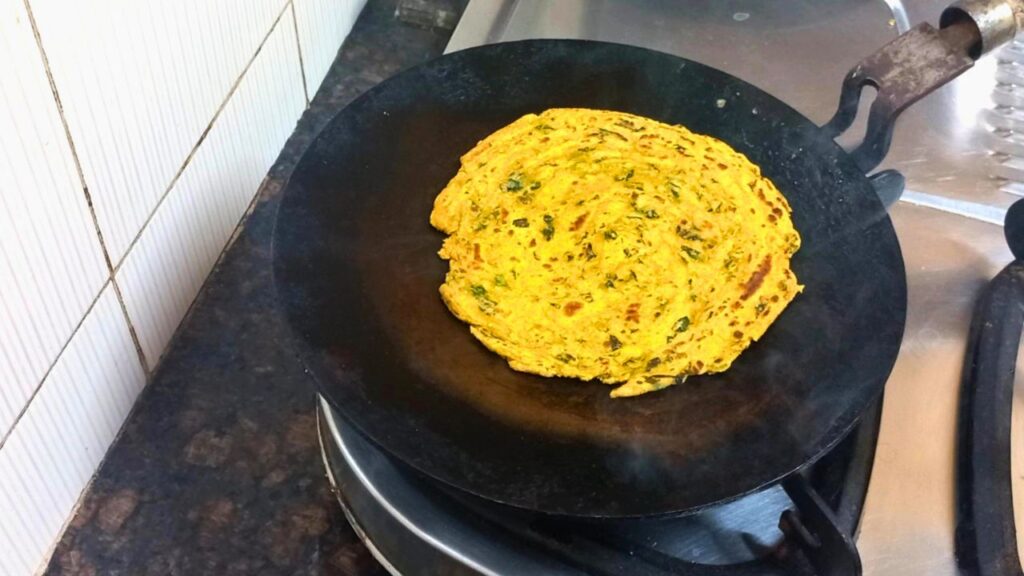cooking of moringa dal paratha 1 Healthically Kitchen
