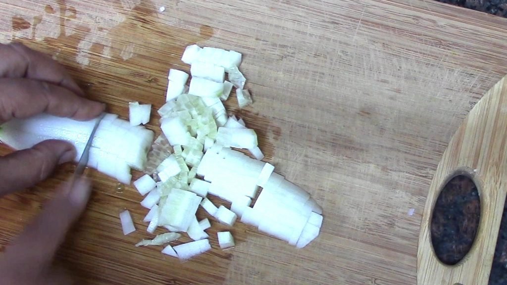chopping cucumber Healthically Kitchen