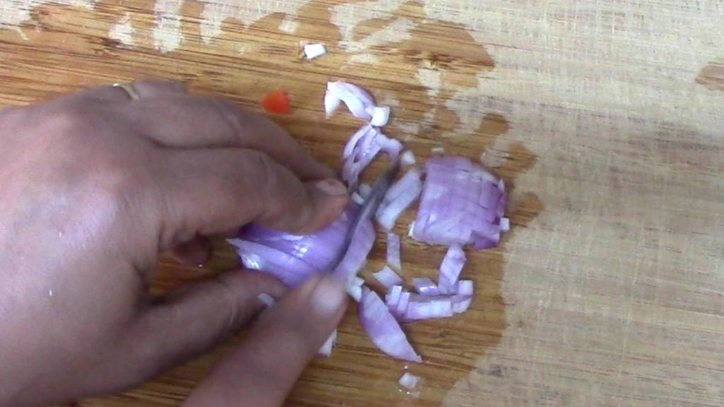 chopping onion Healthically Kitchen