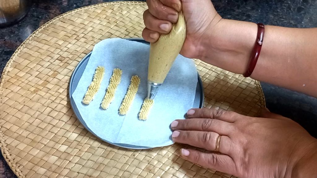 Kesar Jowar Cookies Recipe in Air Fryer 12 pipeing of cookies Healthically Kitchen