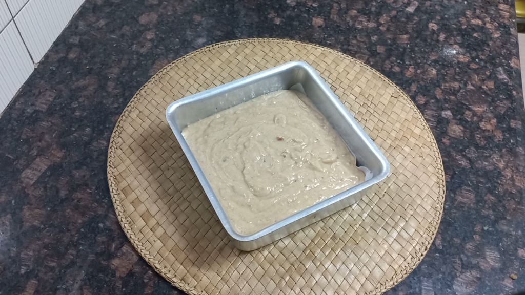 Eggless Nuts and Seeds Cake Without Maida | Atta Cake 12 pour in the cake tin Healthically Kitchen